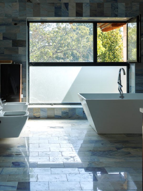 Spacious bathroom with modern equipment after major renovation of the house